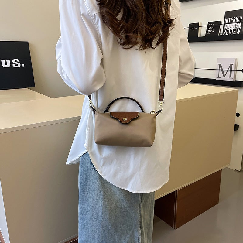 Naisten muotiraita mini crossbody laukku